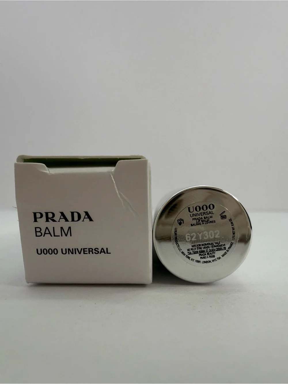 Prada Mini Lip Balm Universal U000- Green goes on clear